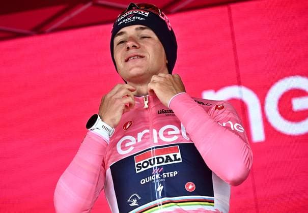 May 14, 2023, CESENA, ITALY: Belgian rider Remco Evenepoel of team Soudal Quick-Step celebrate on the podium wearing the overall leader s pink jersey after winning the ninth stage ITT crono anof the 2023 Giro d Italia cycling race over 35 km from Savignano sul Rubicone to Cesena, Italy, 14 May 2023. ANSA LUCA ZENNARO Giro d Italia - 9th stage Itt  - ZUMAa110 20230514_zaf_a110_132 Copyright: xZenx