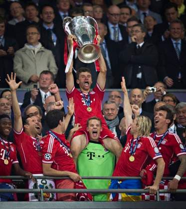 London, 25 05 2013, Wembley Munich final cheer Thomas Mueller FCB , goalkeeper Manuel Neuer FCB with trophy Borussia Dortmund FC Bayern Munich mens Champions League final