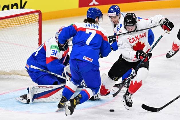 L-R goalkeeper Samuel Hlavaj (SVK), Mario Grman (SVK), Patrik Koch (SVK) and Cody Glass (CAN) in action during the IIHF Ice hockey, Eishockey World Championship, WM, Weltmeisterschaft Group B match Slovakia vs Canada, on May 15, 2023, in Riga, Latvia. (CTKxPhoto DavidxTanecek) CTKPhotoP2023051505102  CTKPhotoP2023051505102