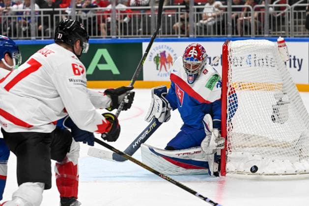RIGA, LATVIA MAY 15 goalkeeper Samuel Hlavaj of Slovakia makes a save during the 2023 IIHF Ice Hockey World Championship Finland Latvia game between Slovakia and Canada at Arena Riga on May 15, 2023 in Riga, Latvia Riga Arena Riga Latvia  Copyright: xJustPictures.ch AndreaxBrancax
