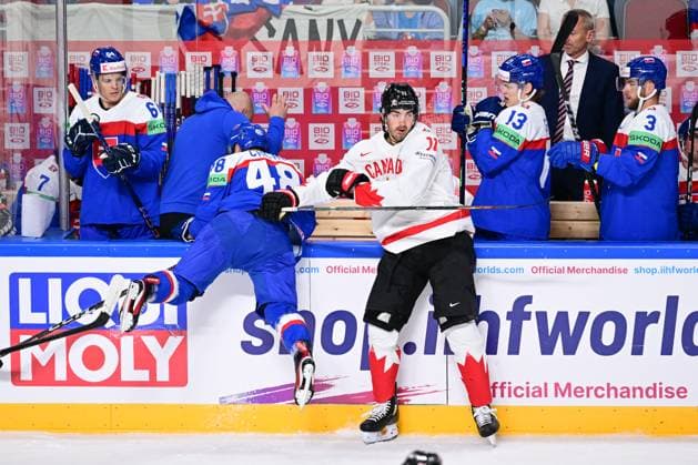 L-R Viliam Cacho (SVK) and Jack McBain (CAN) in action during the IIHF Ice hockey, Eishockey World Championship, WM, Weltmeisterschaft Group B match Slovakia vs Canada, on May 15, 2023, in Riga, Latvia. (CTKxPhoto DavidxTanecek) CTKPhotoP2023051505419  CTKPhotoP2023051505419