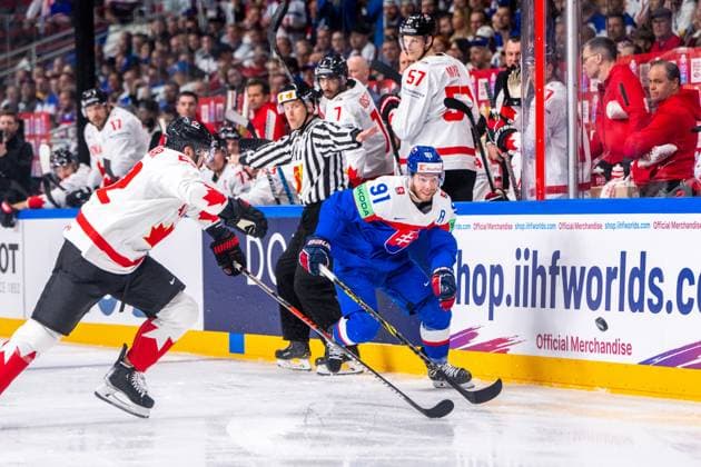 RIGA, LATVIA MAY 15 Matus Sukel of Slovakia R against MacKenzie Weegar of Canada during the 2023 IIHF Ice Hockey World Championship Finland Latvia game between Slovakia and Canada at Arena Riga on May 15, 2023 in Riga, Latvia Riga Arena Riga Latvia  Copyright: xJustPictures.ch JarixPestelaccix
