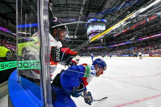 RIGA, LATVIA MAY 15 Pierre Olivier Joseph of Canada and Pavol Regenda of Slovakia fight along the boards during the 2023 IIHF Ice Hockey World Championship Finland Latvia game between Slovakia and Canada at Arena Riga on May 15, 2023 in Riga, Latvia Riga Arena Riga Latvia  Copyright: xJustPictures.ch AndreaxBrancax