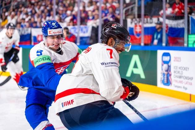 RIGA, LATVIA MAY 15 Simon Nemec of Slovakia L make a hit on Pierre Olivier Joseph of Canada R during the 2023 IIHF Ice Hockey World Championship Finland Latvia game between Slovakia and Canada at Arena Riga on May 15, 2023 in Riga, Latvia Riga Arena Riga Latvia  Copyright: xJustPictures.ch JarixPestelaccix