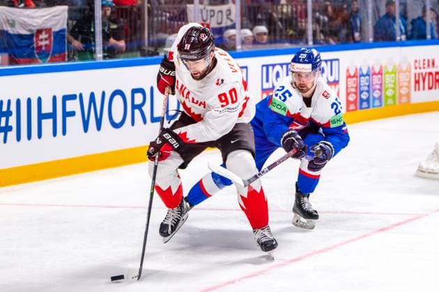 RIGA, LATVIA MAY 15 Joe Veleno of Canada L against Alex Tamasi of Slovakia R during the 2023 IIHF Ice Hockey World Championship Finland Latvia game between Slovakia and Canada at Arena Riga on May 15, 2023 in Riga, Latvia Riga Arena Riga Latvia  Copyright: xJustPictures.ch JarixPestelaccix