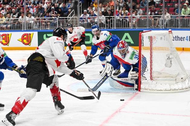 RIGA, LATVIA MAY 15 goalkeeper Samuel Hlavaj of Slovakia follows the puck during the 2023 IIHF Ice Hockey World Championship Finland Latvia game between Slovakia and Canada at Arena Riga on May 15, 2023 in Riga, Latvia Riga Arena Riga Latvia  Copyright: xJustPictures.ch AndreaxBrancax