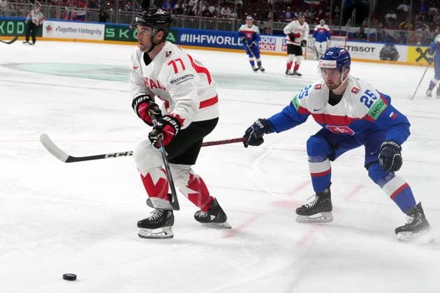 (230516) -- RIGA, May 16, 2023 -- Slovakia s defenseman Alex Tamasi (R) vies with Canada s defenseman Brad Hunt during the Group B match between Canada and Slovakia at the 2023 IIHF Ice hockey, Eishockey World Championship, WM, Weltmeisterschaft in Riga, Latvia, May 15, 2023. (Photo by Xinhua) (SP)LATVIA-RIGA-2023 IIHF ICE HOCKEY WORLD CHAMPIONSHIP-CANADA VS SLOVAKIA EdijsxPalens 
