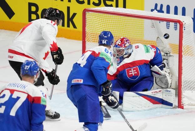 (230516) -- RIGA, May 16, 2023 -- Slovakia s goalkeeper Samuel Hlavaj (R) tries to make a save during the Group B match between Canada and Slovakia at the 2023 IIHF Ice hockey, Eishockey World Championship, WM, Weltmeisterschaft in Riga, Latvia, May 15, 2023. (Photo by Xinhua) (SP)LATVIA-RIGA-2023 IIHF ICE HOCKEY WORLD CHAMPIONSHIP-CANADA VS SLOVAKIA EdijsxPalens 