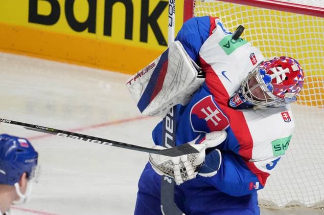 (230516) -- RIGA, May 16, 2023 -- Slovakia s goalkeeper Samuel Hlavaj tries to make a save during the Group B match between Canada and Slovakia at the 2023 IIHF Ice hockey, Eishockey World Championship, WM, Weltmeisterschaft in Riga, Latvia, May 15, 2023. (Photo by Xinhua) (SP)LATVIA-RIGA-2023 IIHF ICE HOCKEY WORLD CHAMPIONSHIP-CANADA VS SLOVAKIA EdijsxPalens 