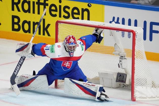 (230516) -- RIGA, May 16, 2023 -- Slovakia s goalkeeper Samuel Hlavaj tries to make a save during the Group B match between Canada and Slovakia at the 2023 IIHF Ice hockey, Eishockey World Championship, WM, Weltmeisterschaft in Riga, Latvia, May 15, 2023. (Photo by Xinhua) (SP)LATVIA-RIGA-2023 IIHF ICE HOCKEY WORLD CHAMPIONSHIP-CANADA VS SLOVAKIA EdijsxPalens 