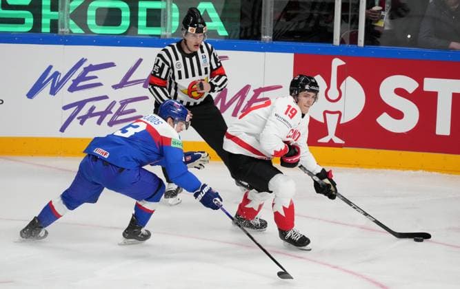 (230516) -- RIGA, May 16, 2023 -- Slovakia s defenseman Adam Janosik (L) vies with Canada s forward Peyton Krebs during the Group B match between Canada and Slovakia at the 2023 IIHF Ice hockey, Eishockey World Championship, WM, Weltmeisterschaft in Riga, Latvia, May 15, 2023. (Photo by Xinhua) (SP)LATVIA-RIGA-2023 IIHF ICE HOCKEY WORLD CHAMPIONSHIP-CANADA VS SLOVAKIA EdijsxPalens 
