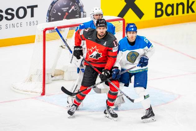 RIGA, LATVIA MAY 17 Milan Lucic of Canada L fighting for a position into the slot against Samat Daniyar of Kazakhstan R during the 2023 IIHF Ice Hockey World Championship Finland Latvia game between Canada and Kazakhstan at Arena Riga on May 17, 2023 in Riga, Latvia Riga Arena Riga Latvia  Copyright: xJustPictures.ch JarixPestelaccix