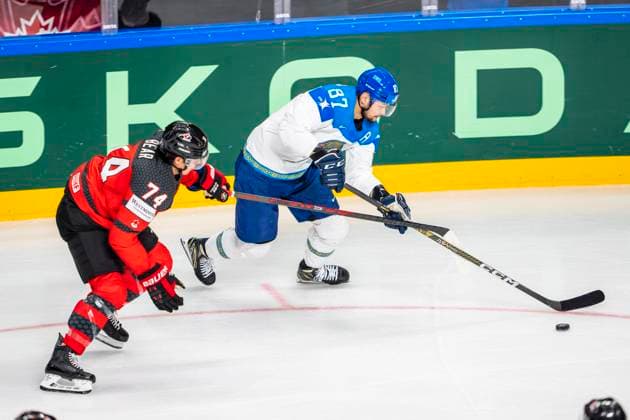 RIGA, LATVIA MAY 17 Adil Beketayev of Kazakhstan R chased by Ethan Bear of Canada L during the 2023 IIHF Ice Hockey World Championship Finland Latvia game between Canada and Kazakhstan at Arena Riga on May 17, 2023 in Riga, Latvia Riga Arena Riga Latvia  Copyright: xJustPictures.ch JarixPestelaccix
