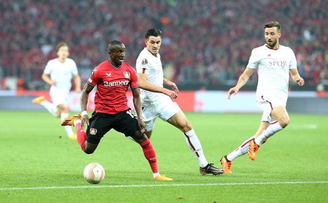 18 05 2023, Football UEFA Europa League 2022 2023, Semifinal, Bayer 04 Leverkusen AS Roma, at BayArena Leverkusen L R Moussa Diaby Bayer Leverkusen vs Roger Ibanez AS Roma DFL and DFB regulations prohibit any use of photographs as image sequences and or quasi video