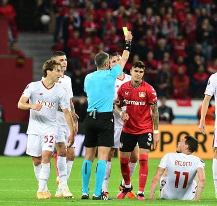 18 05 2023 Leverkusen football, mens, Europa League, semifinals, 2022 2023 season, Bayer 04 Leverkusen vs AS Roma referee Slavko Vinci shows Piero Hincapie Leverkusen, 3 the yellow card DFL regulations prohibit any use of photographs as image sequences and or quasi video BayArena NRW Germany
