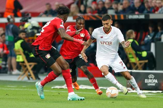 Lorenzo PELLEGRINI AS Roma, 7 , Edmond TAPSOBA Bayer 04 Leverkusen, 12 , Jeremie FRIMPONG Bayer 04 Leverkusen, 30 , Leverkusen, Football UEFA Europa League Semi Final, Bayer 04 Leverkusen AS Roma, 18 05 2023, BayArena, Leverkusen UEFA regulations prohibit any use of photographs as image sequences and or quasi video Â