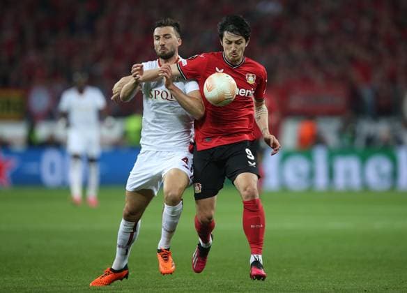 Bayer 04 Leverkusen v AS Roma, UEFA Europa League, Semi finals, 2nd leg, Bay Arena, Cologne, Germany, 18th May 2023 Sardar Azmoun of Bayer Leverkusen battles Bryan Cristante of Roma. - Bayer 04 Leverkusen v AS Roma, UEFA Europa League, Semi finals, 2nd leg, Bay Arena, Cologne, Germany. - 18th May 2023. Cologne Bay Arena Germnay Copyright: xDanxWeirx CP_Bayer_Leverkusen_AS_Roma_35