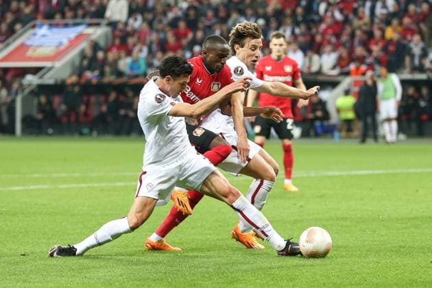 Germany, Leverkusen, 18 05 2023, BayArena, Bayer 04 Leverkusen AS Rom Uefa Europa Leaque, Roger Ibanez AS Rom , Moussa Diaby Bayer 04 Bayer 04 Leverkusen and Edoardo Bove AS Rom battle for the ball Leverkusen BayArena North Rhine Westfalia Germany  eu-images-678