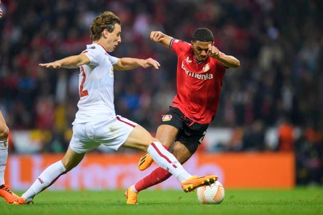 Soccer Europa League, 2022 2023 season, semifinals, Bayer 04 Leverkusen AS Rome on 18 05 2023 in Leverkusen North Rhine Westphalia Rome™s Rick Karsdorp in a duel with Leverkusen s Amine Adli Copyright: xChristopherxNeundorfx xKirchnerxMediax