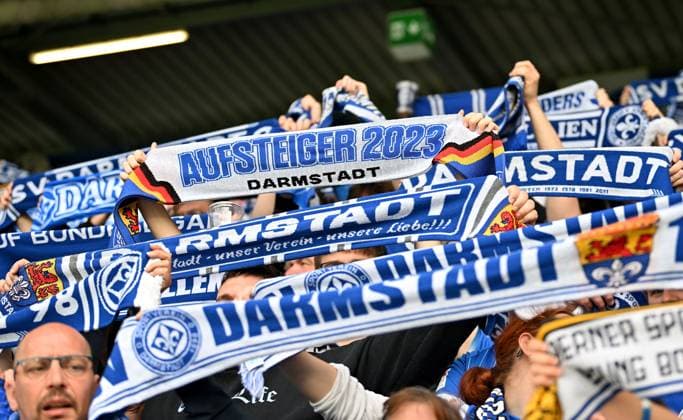 19 05 2023, xfux, football 2 Bundesliga, SV Darmstadt 98 1 FC Magdeburg, emonline, emspor, v l fans SV Darmstadt 98, SVD, Lilies, mood, scarves, jerseys, Fan wearing a scarf with the inscription ãAufsteiger 2023Ò promotion DFL DFB REGULATIONS PROHIBIT ANY USE OF PHOTOGRAPHS as IMAGE SEQUENCES and or QUASI VIDEO Licensing of the photographic work to SV Darmstadt 1898 e V and subsidiaries is not permitted NO release of or sale to SV Darmstadt 1898 e V Darmstadt