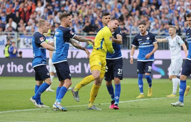 19 05 2023, xdcx, football 2 Bundesliga, SV Darmstadt 98 1 FC Magdeburg, emonline, emspor, despor, v l , Fabian Holland SV Darmstadt 98 , Tobias Kempe SV Darmstadt 98 , goalkeeper Marcel Schuhen SV Darmstadt 98 , Klaus Gjasula SV Darmstadt 98 cheering cheering cheering cheering DFL DFB REGULATES PROHIBIT ANY USE OF PHOTOGRAPHS AS IMAGE SEQUENCES AND OR QUASI VIDEO Copyright: HMBxMedia Claus