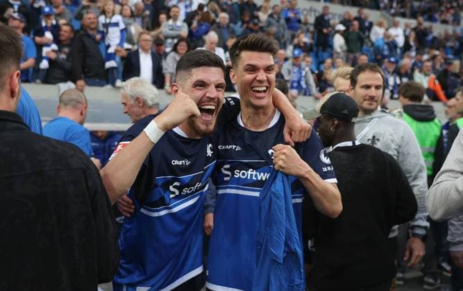 19 05 2023, xdcx, football 2 Bundesliga, SV Darmstadt 98 1 FC Magdeburg, emonline, emspor, despor, v l , Emir Karic SV Darmstadt 98 and Mathias Honsak SV Darmstadt 98 celebrate promotion DFL DFB REGULATIONS PROHIBIT ANY USE OF PHOTOGRAPHS AS IMAGE SEQUENCES AND OR QUASI VIDEO Copyright: HMBxMedia Claus