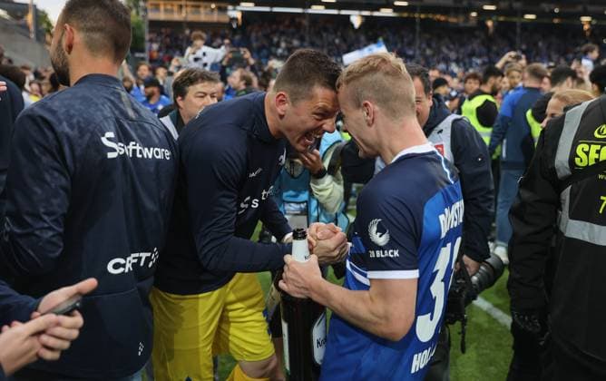 19 05 2023, xdcx, football 2 Bundesliga, SV Darmstadt 98 1 FC Magdeburg, emonline, emspor, despor, v l , goalkeeper Alexander Brunst SV Darmstadt 98 and Fabian Holland SV Darmstadt 98 celebrate promotion DFL DFB REGULATIONS PROHIBIT ANY USE OF PHOTOGRAPHS AS IMAGE SEQUENCES AND OR QUASI VIDEO Copyright: HMBxMedia Claus