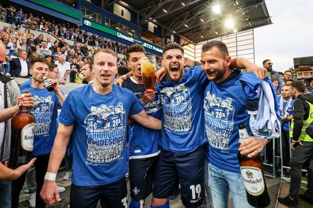 Darmstadt, 19 May 2024 Football 2 Bundesliga SV Darmstadt 98 1 FC Magdeburg v l , Matthias Bader SV Darmstadt 98 , Fabian Holland SV Darmstadt 98 , Mathias Honsak SV Darmstadt 98 , Emir Karic SV Darmstadt 98 , Goalkeeper Steve Kroll SV Darmstadt 98 cheer cheers after end of game DFL DFB REGULATIONS PROHIBIT ANY USE OF PHOTOGRAPHS as IMAGE SEQUENCES and or QUASI VIDEO Copyright: JoaquimxFerreira
