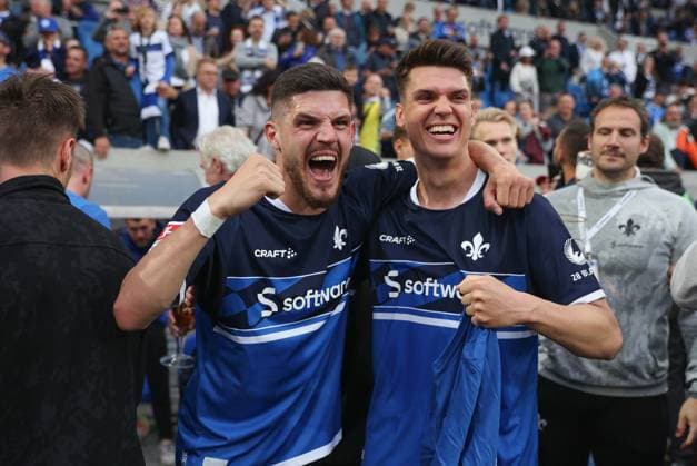19 05 2023, xdcx, football 2 Bundesliga, SV Darmstadt 98 1 FC Magdeburg, emonline, emspor, despor, v l , Emir Karic SV Darmstadt 98 and Mathias Honsak SV Darmstadt 98 celebrate promotion DFL DFB REGULATIONS PROHIBIT ANY USE OF PHOTOGRAPHS AS IMAGE SEQUENCES AND OR QUASI VIDEO Copyright: HMBxMedia Claus
