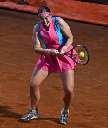 (230520) -- ROME, May 20, 2023 -- Jelena Ostapenko of Latvia hits a return during a semifinal match between Elena Rybakina of Kazakhstan and Jelena Ostapenko of Latvia at the WTA, Tennis Damen Italian Open in Rome, Italy, May 19, 2023. (Photo by Xinhua) (SP)ITALY-ROME-TENNIS-WTA 1000-SEMIFINAL AlbertoxLingria 