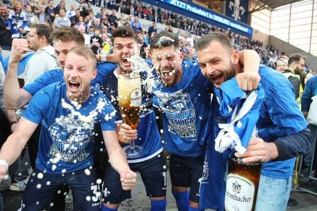 19 05 2023, xtvx, football 2 Bundesliga, SV Darmstadt 98 1 FC Magdeburg emspor, emonline, v l after the match cheers Fabian Holland SV Darmstadt 98 Mathias Honsak SV Darmstadt 98 Emir Karic SV Darmstadt 98 DFL DFB REGULATIONS PROHIBIT ANY USE OF PHOTOGRAPHS AS IMAGE SEQUENCES AND OR QUASI VIDEO Darmstadt