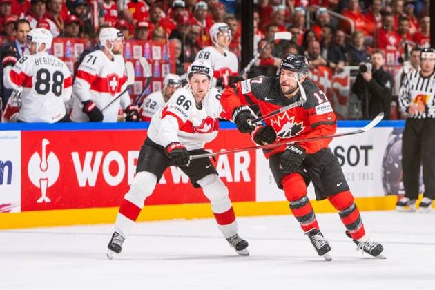 RIGA, LATVIA MAY 20 Janis Moser of Switzerland L against Milan Lucic of Canada R during the 2023 IIHF Ice Hockey World Championship Finland Latvia game between Canada Switzerland at Arena Riga on May 20, 2023 in Riga, Latvia Riga Arena Riga Latvia  Copyright: xJustPictures.ch JarixPestelaccix