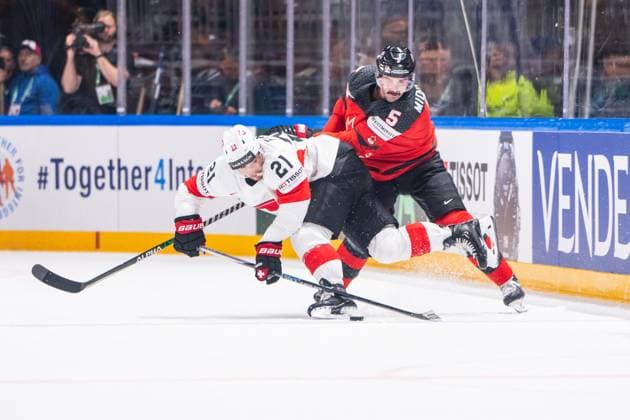 RIGA, LATVIA MAY 20 Kevin Fiala of Switzerland L against Jacob Middleton of Canada R during the 2023 IIHF Ice Hockey World Championship Finland Latvia game between Canada Switzerland at Arena Riga on May 20, 2023 in Riga, Latvia Riga Arena Riga Latvia  Copyright: xJustPictures.ch JarixPestelaccix