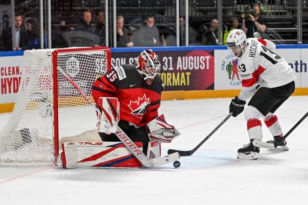 RIGA, LATVIA MAY 20 Nico Hischier of Switzerland tries to score against goalkeeper Samuel Montembeault of Canada during the 2023 IIHF Ice Hockey World Championship Finland Latvia game between Canada Switzerland at Arena Riga on May 20, 2023 in Riga, Latvia Riga Arena Riga Latvia  Copyright: xJustPictures.ch AndreaxBrancax