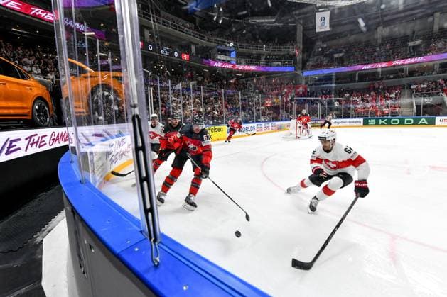 RIGA, LATVIA MAY 20 Lawson Crouse of Canada in action against Denis Malgin of Switzerland during the 2023 IIHF Ice Hockey World Championship Finland Latvia game between Canada Switzerland at Arena Riga on May 20, 2023 in Riga, Latvia Riga Arena Riga Latvia  Copyright: xJustPictures.ch AndreaxBrancax