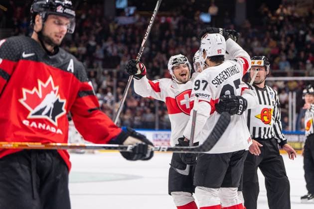 RIGA, LATVIA MAY 20 Kevin Fiala of Switzerland 2nd from L and Jonas Siegenthaler of Switzerland R celebrates Nico Hischier of Switzerland not shown for his goal during the 2023 IIHF Ice Hockey World Championship Finland Latvia game between Canada Switzerland at Arena Riga on May 20, 2023 in Riga, Latvia Riga Arena Riga Latvia  Copyright: xJustPictures.ch JarixPestelaccix