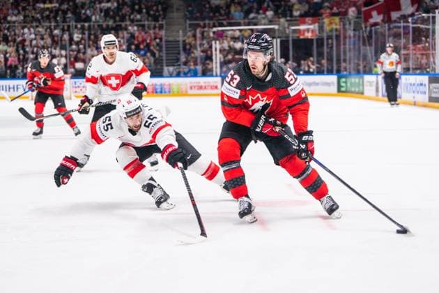 RIGA, LATVIA MAY 20 Michael Carcone of Canada R against Romain Loeffel of Switzerland L during the 2023 IIHF Ice Hockey World Championship Finland Latvia game between Canada Switzerland at Arena Riga on May 20, 2023 in Riga, Latvia Riga Arena Riga Latvia  Copyright: xJustPictures.ch JarixPestelaccix