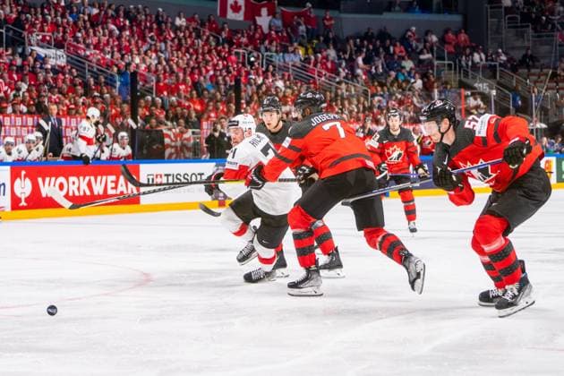 RIGA, LATVIA MAY 20 Tanner Richard of Switzerland L against Pierre Olivier Joseph of Canada C during the 2023 IIHF Ice Hockey World Championship Finland Latvia game between Canada Switzerland at Arena Riga on May 20, 2023 in Riga, Latvia Riga Arena Riga Latvia  Copyright: xJustPictures.ch JarixPestelaccix