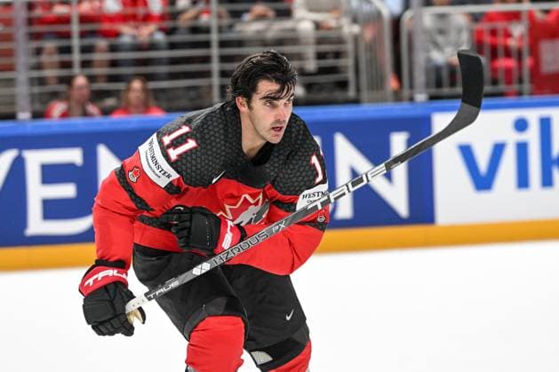 RIGA, LATVIA MAY 20 Jack Mcbain of Canada returns to the bench after losing his helmet during the 2023 IIHF Ice Hockey World Championship Finland Latvia game between Canada Switzerland at Arena Riga on May 20, 2023 in Riga, Latvia Riga Arena Riga Latvia  Copyright: xJustPictures.ch AndreaxBrancax