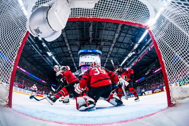 RIGA, LATVIA MAY 20 Dario Simion of Switzerland L against Jacob Middleton of Canada C and goalkeeper Samuel Montembeault of Canada R scores the 3 1 during the 2023 IIHF Ice Hockey World Championship Finland Latvia game between Canada Switzerland at Arena Riga on May 20, 2023 in Riga, Latvia Riga Arena Riga Latvia  Copyright: xJustPictures.ch JarixPestelaccix