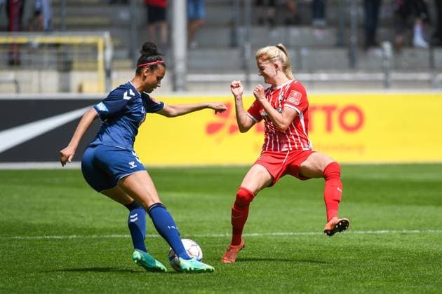 Football FLYERALARM Womens Bundesliga 21 Matchday 22 23 SC Freiburg vs 1 FC Koeln 21 05 2023 Genessee Puntigam 1 FC Koeln 13 in duel with Kim Fellhauer SC Freiburg 5 Football FLYERALARM Womens Bundesliga SC Freiburg vs 1 FC Koeln on Sunday, May 21, 2023 at the Dreisamstadion in Freiburg im Breisgau DFL REGULATIONS PROHIBIT ANY USE OF PHOTOGRAPHS AS IMAGE SEQUENCES AND OR QUASI VIDEO Copyright: xBEAUTIFULxSPORTS GerdxGruendlx