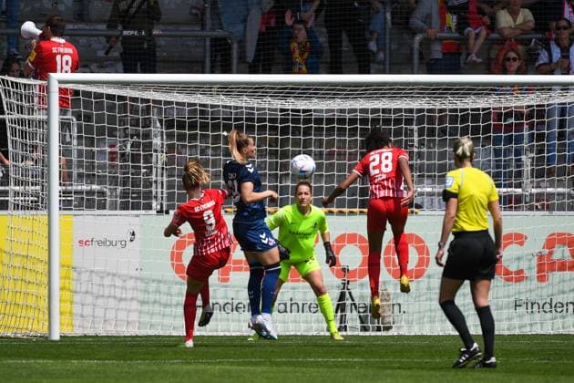 Football FLYERALARM Womens Bundesliga 21 Matchday 22 23 SC Freiburg vs 1 FC Koeln 21 05 2023 Adriana Achcinska 1 FC Koeln 9 receiving the ball and in a duel with Cora Zicai SC Freiburg 28 Football FLYERALARM Womens Bundesliga SC Freiburg vs 1 FC Koeln on Sunday, May 21, 2023 at the Dreisamstadion in Freiburg im Breisgau DFL REGULATIONS PROHIBIT ANY USE OF PHOTOGRAPHS AS IMAGE SEQUENCES AND OR QUASI VIDEO Copyright: xBEAUTIFULxSPORTS GerdxGruendlx