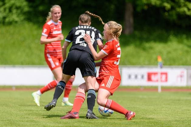Nastassja Lein (24 1. FC Nuremberg) and Eszter Reszler (37 FC Bayern Munich II) during the 2. Frauenbundesliga match between FC Bayern Munich II and 1. FC Nuremberg at Sportpark Aschheim, Germany. (Sven Beyrich SPP) Copyright: xSvenxBeyrich SPPx spp-en-SvBe-20230521-D75_3684