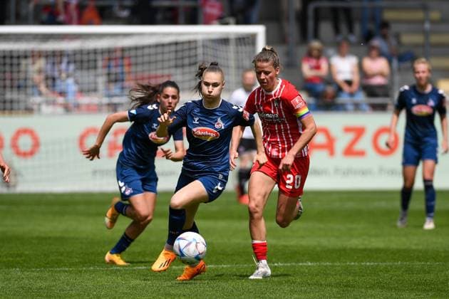 Football FLYERALARM Womens Bundesliga 21 Matchday 22 23 SC Freiburg vs 1 FC Koeln 21 05 2023 Manjou Wilde 1 FC Koeln 7 on the ball and followed by Jana Vojtekova SC Freiburg 20 Football FLYERALARM Womens Bundesliga SC Freiburg vs 1 FC Koeln on Sunday, May 21, 2023 at Dreisamstadion in Freiburg im Breisgau DFL REGULATIONS PROHIBIT ANY USE OF PHOTOGRAPHS AS IMAGE SEQUENCES AND OR QUASI VIDEO Copyright: xBEAUTIFULxSPORTS GerdxGruendlx