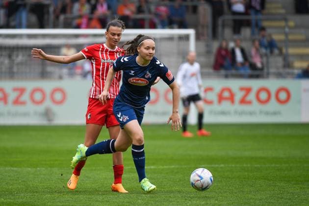 Football FLYERALARM Womens Bundesliga 21 Matchday 22 23 SC Freiburg vs 1 FC Koeln 21 05 2023 Lotta Cordes 1 FC Koeln 15 on the ball and in duel with Riola Xhemaili SC Freiburg 10 Football FLYERALARM Womens Bundesliga SC Freiburg vs 1 FC Koeln on Sunday, May 21, 2023 at the Dreisamstadion in Freiburg im Breisgau DFL REGULATIONS PROHIBIT ANY USE OF PHOTOGRAPHS AS IMAGE SEQUENCES AND OR QUASI VIDEO Copyright: xBEAUTIFULxSPORTS GerdxGruendlx