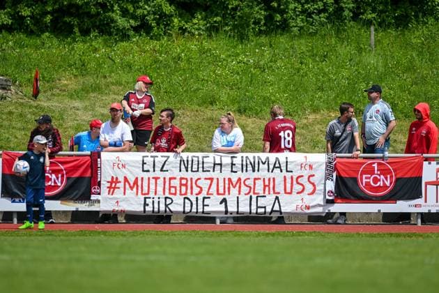 Nuremberg fans put up a banner, 21 05 2023, Aschheim Germany , Football,2 Women Bundesliga, FC Bayern Munich II 1 FC Nuremberg, DFB DFL REGULATES PROHIBIT ANY USE OF PHOTOGRAPHS AS IMAGE SEQUENCES AND OR QUASI VIDEO xslx