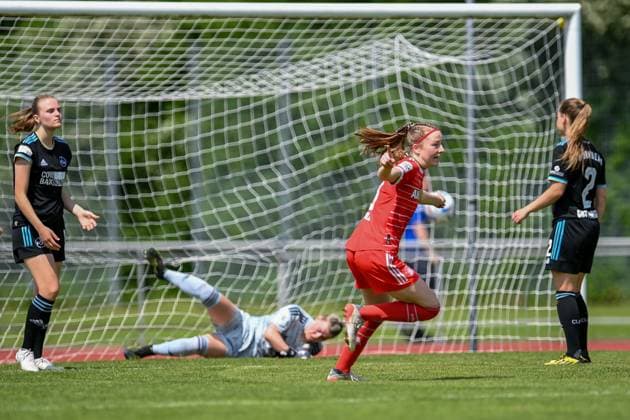 Marlene Wild FCB, 3 scores 1 0 and turns away jubilant, jubilation, goal celebration, celebrate the goal, goal, celebration, jubilation about the goal, optimistic, action, action , Lea Paulick goalkeeper, Nuremberg, 1 beaten, Amelie Thöle Nuremberg, 12 li and Kuisa Guttenberger Nuremberg, 2 re looking disappointed, disappointment, frustration, disappointed, pessimistic, 21 05 2023, Aschheim Germany , Football,2 Women Bundesliga, FC Bayern Munich II 1 FC Nuremberg, DFB DFL REGULATES PROHIBIT ANY USE OF PHOTOGRAPHS AS IMAGE SEQUENCES AND OR QUASI VIDEO xslx
