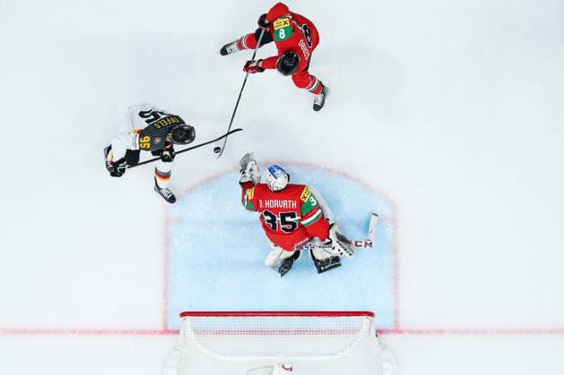 Sport Themen der Woche KW20 Sport Bilder des Tages Ice hockey, Eishockey - IIHF WC 2023 TAMPERE,FINLAND,21.MAY.23 - ICE HOCKEY - IIHF Ice Hockey World Championship, WM, Weltmeisterschaft 2023, group stage, Germany vs Hungary. Image shows Frederik Tiffels (GER), Dominik Horvath and Bence Szabo (HUN).  GEPAxpictures xDanielxGoetzhaber