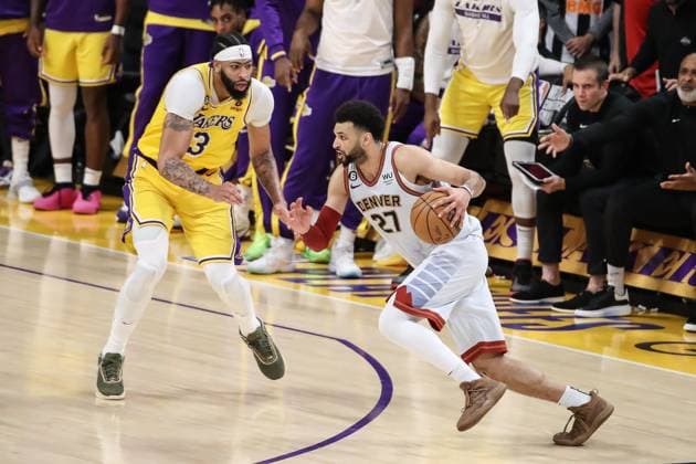 LOS ANGELES, CA - MAY 22: Denver Nuggets guard Jamal Murray (27) drives on Los Angeles Lakers forward Anthony Davis (3) during game 4 of the NBA, Basketball Herren, USA Western Conference between the Denver Nuggets and the Los Angeles Lakers on May 22, 2023, at Cyrpto.com Arena in Los Angeles, CA. (Photo by Jevone Moore Icon Sportswire) NBA: MAY 22 NBA Playoffs - Nuggets at Lakers EDITORIAL USE ONLY Icon2305221303