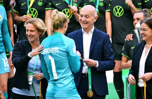 Football, Germany, Women, Season 2022 2023, DFB Cup Final, Rhein Energie Stadium Cologne, VfL Wolfsburg SC Freiburg 4 1 DFB President Bernd Neuendorf, National Coach Martina Voss Tecklenburg and Merle Frohms WOL at the Award Ceremony DFB DFL REGULATIONS PROHIBIT ANY USE OF PHOTOGRAPHS AS IMAGE SEQUENCES AND OR QUASI VIDEO